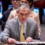 At the UN, the American delegation leaves a meeting of the Security Council after French criticism