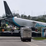In Miami, an Amazon cargo plane goes off the runway, killing five and injuring five