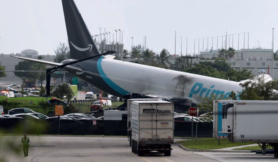 In Miami, an Amazon cargo plane goes off the runway, killing five and injuring five