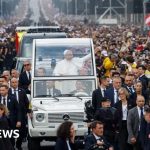 Huge crowds greet Pope in Paris before open-air mass - BBC News Africa