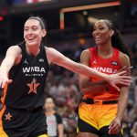 Breanna Stewart and A'ja Wilson are sitting at the adult table