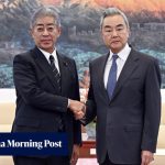 China warns Japan over WWII history as trade delegation visits Beijing