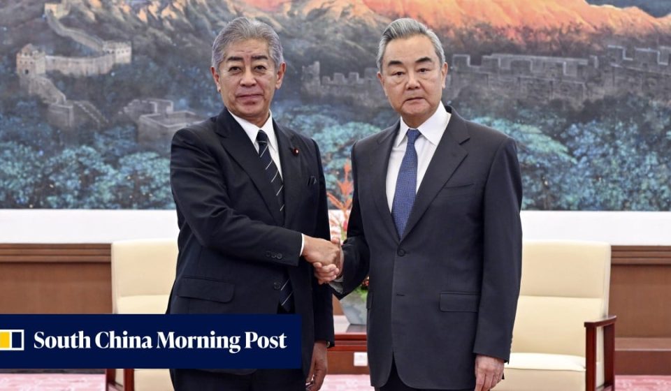 China warns Japan over WWII history as trade delegation visits Beijing