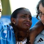 Berlin Marathon: Tigst Assefa wins but injury stops world record