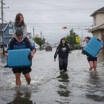 Nor'easter brings heavy flooding and major power outages to the East Coast