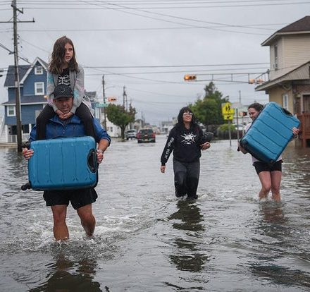 Nor'easter brings heavy flooding and major power outages to the East Coast