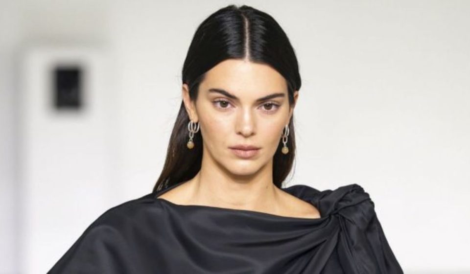 Jacob Elordi refuses to let go of Kendall Jenner as they head to a car in Paris