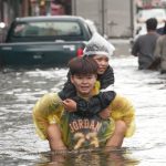 Bangkok floodwaters begin to ease after weekend of torrential rain