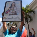 Supporters of Venezuelan opposition leader Machado rally for her return