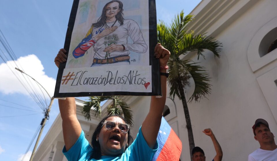 Supporters of Venezuelan opposition leader Machado rally for her return