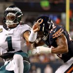 Jalen Hurts sent to sideline for concussion control; Andy Dalton throws red zone INT