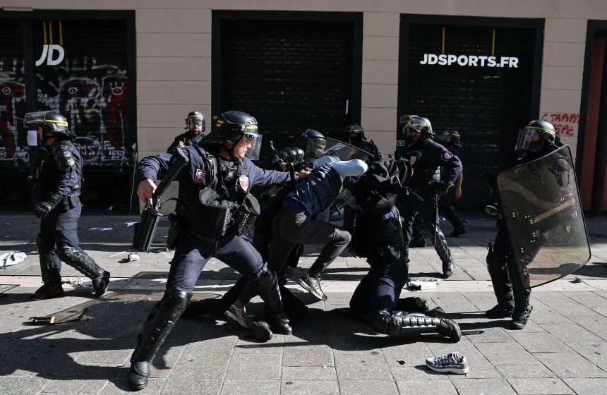 Half a million protesters sweep across France in massive youth unrest