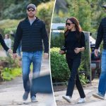 Prince Harry and Meghan Markle hold hands during a romantic pub date