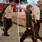 Taylor Swift and Travis Kelce hold hands on date night in NYC amid bitter feud with neighbors