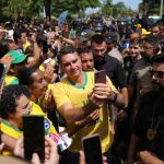 Brazilians Lula and Flávio Bolsonaro campaign in powerful state ahead of Sunday's presidential election
