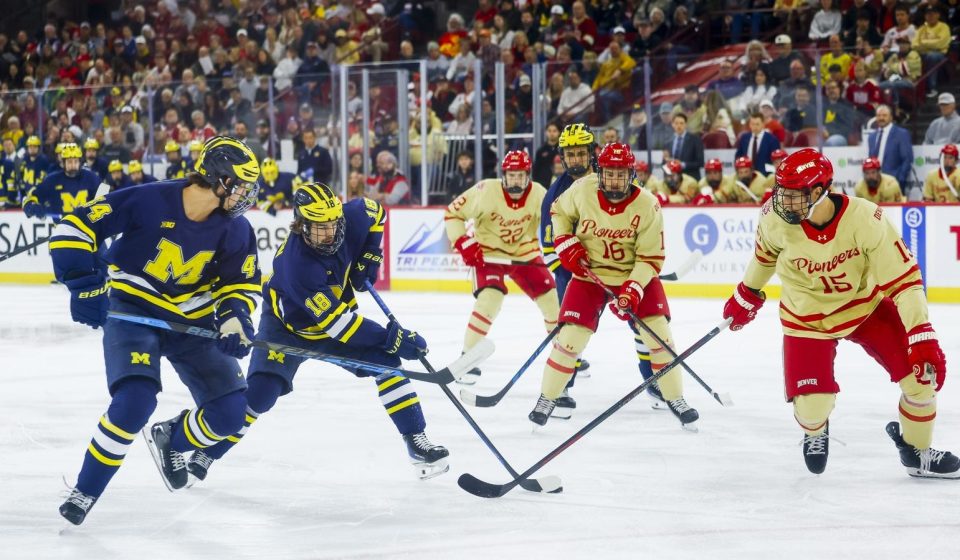 Michigan sets the tone by toppling number one Denver