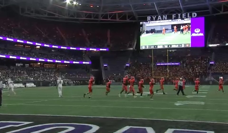 The Evanston Township High School marching band was allegedly the subject of racist and homophobic comments during New Trier's game at New Ryan Field.