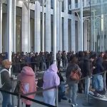 Lines surround Apple's Fifth Avenue flagship store in Midtown for the release of the new iPhone Duo