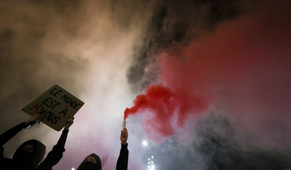 Soldiers guard central Milan as thousands march in cities across Europe
