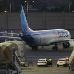 Flydubai pilot attacked captain with cockpit ax in attempted terror attack, UAE official says