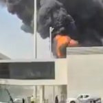 Riyadh airport attack kills 12, including an American, and injures hundreds, according to Saudi officials.