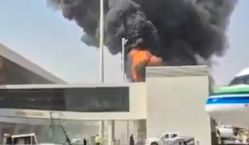 Riyadh airport attack kills 12, including an American, and injures hundreds, according to Saudi officials.
