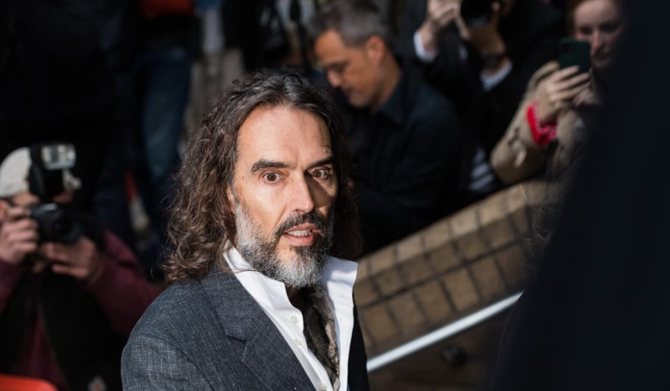 Russell Brand arrives at a London court for his rape and sexual assault trial