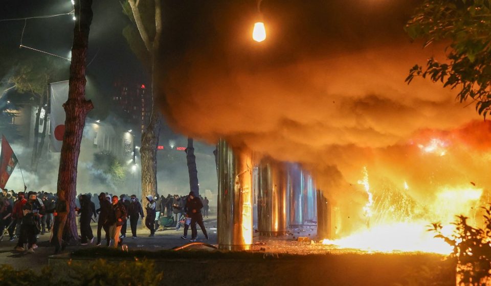 Albanian leader defies calls to resign as student protesters go on rampage in capital