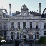 The ruins of the town hall, symbol of a France divided by demonstrations