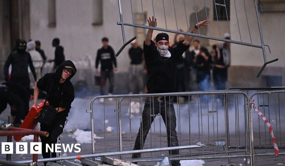 Meloni holds emergency meeting after violent clashes in Milan - BBC News Africa
