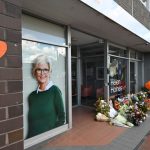 Australian lawmaker attacked with car has legs amputated, husband says