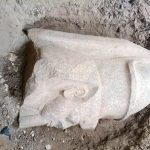An Egyptian farmer discovered 'an unusual stone'. This led archaeologists to discover pieces of statues of an ancient king.