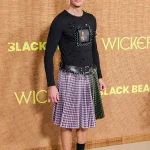Alexander Skarsgard Wears Olivia Colman's Face on the 'Wicker' Red Carpet