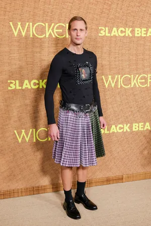 Alexander Skarsgard Wears Olivia Colman's Face on the 'Wicker' Red Carpet