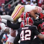 Christian McCaffrey injury update: 49ers RB treated on sideline vs. Falcons