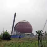 A 262-foot smokestack at a German nuclear power plant tipped onto its side seconds after the charges were triggered, and the 157-foot steel sphere that contained the reactor then descended, cleared to be cut up for scrapping, so the site could cease to be a nuclear power plant after 21 years of dismantling.