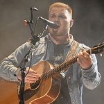 Zach Bryan wears a “Free Palestine” jersey during a concert at Gillette Stadium