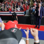 In Kansas, Trump attacks Democrat Adam Hamilton, saying he's 'making fun of Jesus'