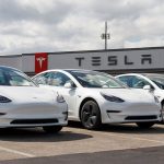 Tesla delivered 486,532 electric vehicles in the third quarter, beating estimates. The stock is rising.