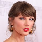 Taylor Swift Debuts Shorter Hair and Revives Her Curls to Celebrate Career Achievement