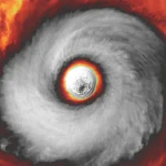 See the giant eye of Super Typhoon Champi as it swirls across the Pacific