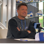 Bob Chesney offers to help Dante Moore after he suffers a concussion
