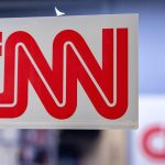 Judge urges Justice Department to justify White House media ban