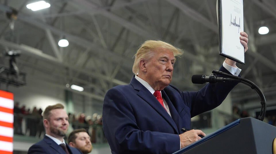 Trump pardons two auto workers on stage at Alaska rally