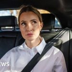 EV drivers love their cars, but some passengers feel sick – maybe that's why - BBC
