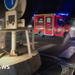 Bus hits stopped train on French side of Channel Tunnel, injuring 19 - BBC