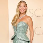 Kate Hudson shows off impressive abs in red bikini during beach workout