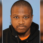 Man charged with murder in slaying of former co-worker at gas station near Space Needle