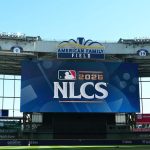Bright lights not too bright for Brewers or Front Row superfan Amy in NLCS Game 1