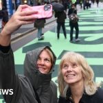 Shoppers fill Oxford Street on first traffic-free day - BBC